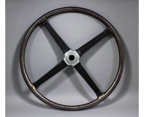 An early light weight steering wheel, possibly from a racing car or boat, 21ins diameter, the upper part stamped "Zero" and "