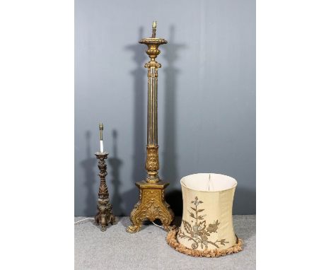 An Italian gilt and blue painted electric standard lamp with urn pattern top, fluted column with leaf capped base, and on tri