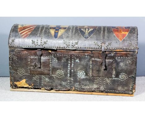A 16th Century European leather covered wooden domed top trunk with wrought iron carrying handles and brass nail studding, th