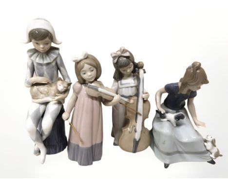 Four Nao figures including girl musicians, etc, tallest 23 cm.
