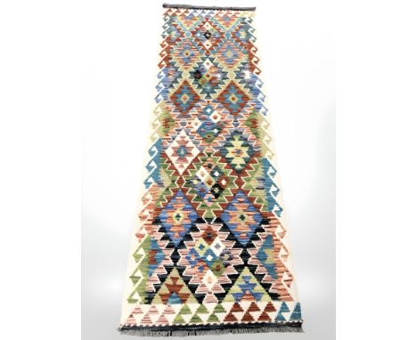 A Chobi Kilim runner, 198 cm x 72 cm 