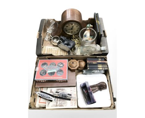 An inlaid mahogany mantle clock, knife rests, brass door furniture, die cast model ships, several volumes, treen, etc. (2 box
