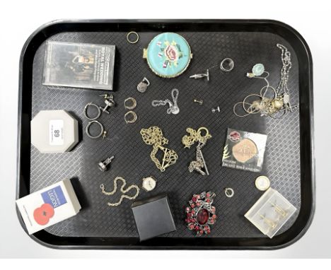 A group of silver and costume jewellery, compact, cuff links, earrings etc