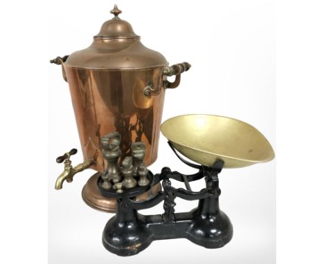 A Victorian copper samovar, height 45 cm, together with a set of scales with weights.