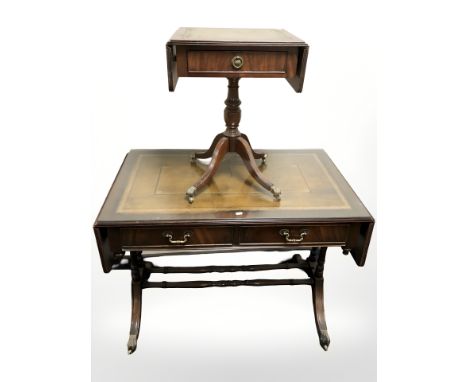 A reproduction mahogany drop leaf sofa table, length 103 cm unextended, and a further smaller single drawer table.