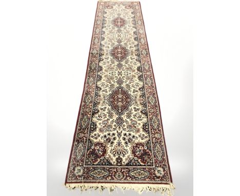 A machine made runner of Persian design, 361 cm x 90 cm 