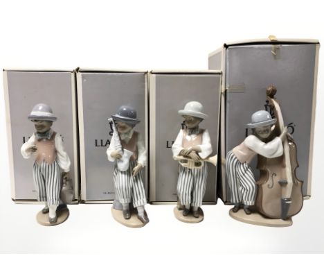 Four Lladro jazz band figures comprising of Jazz Sax, Jazz Horn, Jazz Clarinet and Jazz Bass, all boxed.
