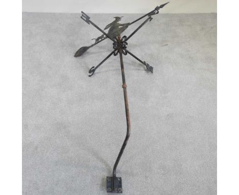 A black painted iron weather vane, surmounted by a witch, 155cm high