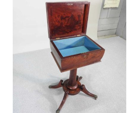 A Regency fruitwood teapoy, with a hinged cavetto moulded lid, on a splayed platform base54w x 40d x 79h overall