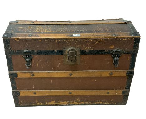 Late 19th to early 20th century travelling trunk, dome top hinged lid
