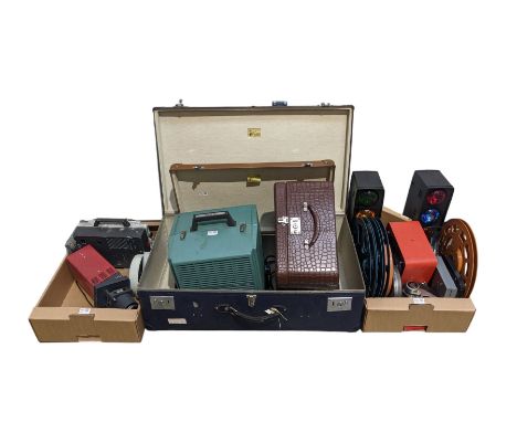 Vintage projector, three vintage cases, various plastic spools for film and other miscellaneous items