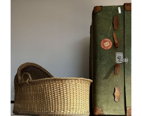 Early 20th century travel trunk covered in green fabric; and wicker moses basketDimensions: Length/Width:&nbsp;92cm&nbsp; Dep