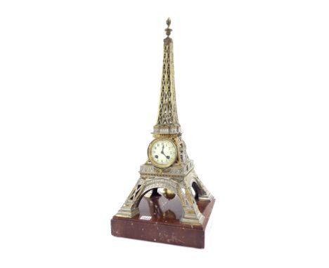 French silver plated novelty two train mantel clock in the form of the Eiffel Tower, the Japy Freres movement striking on a b