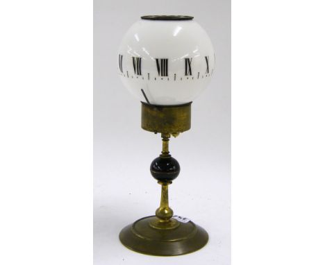 Brass pedestal night clock, with spherical opaline glass dial, 9.25" high