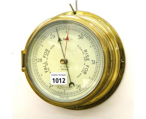 Brass bulkhead barometer, the 6" cream dial signed C. Olsen, Grimsby with Sestrel trademark