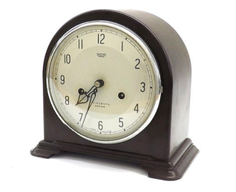 Smiths Enfield two train mantel clock, the 5.75" silvered dial within a Bakelite rounded arched case, 8.25" high (key and pen