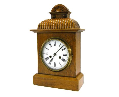 German light oak two train mantel clock striking on a gong, the 6.25" white dial within a stepped case surmounted by a gadroo