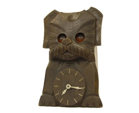 Novelty carved wooden mantel clock timepiece, in the form of a dog with moving eyes, 7.5" high