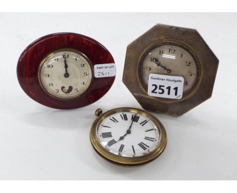 Small silvered easel timepiece, the 2" silvered dial within an octagonal engine turned surround, 3.25" high; also a small Fre