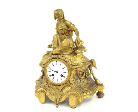 Gilt metal two train figural mantel clock, the movement with outside countwheel striking on a bell, the 3.5" white dial withi