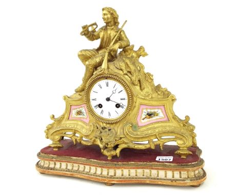 French gilt metal and porcelain mounted two train mantel clock, the movement striking on a bell, the 3.25" white dial within 