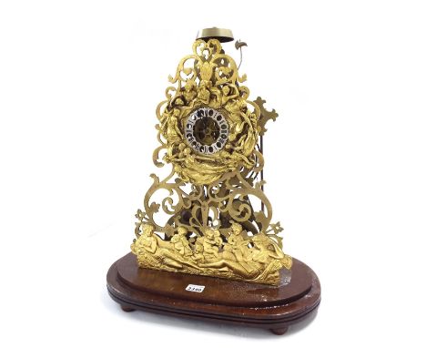 Unusual large double fusee brass skeleton clock, the movement striking on a bell in the arch and on a gong behind, the chrono