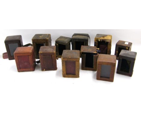 Twelve leather carriage clock travelling cases, with an assortment of associated keys