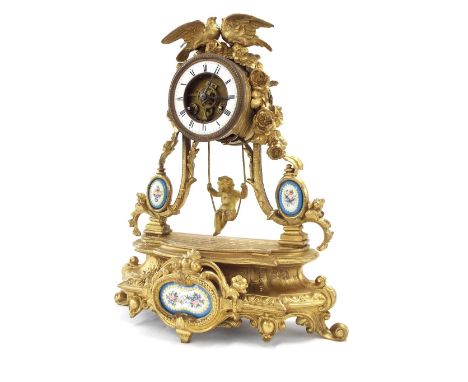 French gilt metal two train drumhead mantel timepiece, the movement signed Farcot with outside countwheel and striking on a b