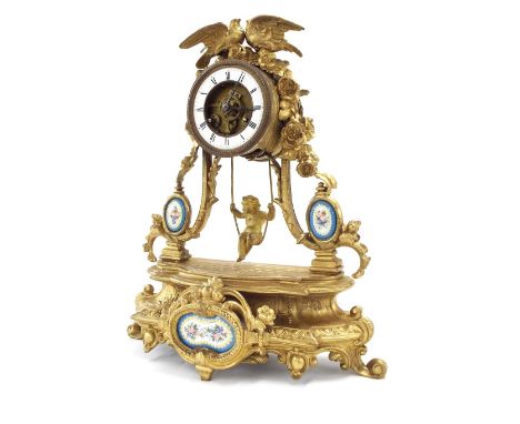 French gilt metal two train drumhead mantel timepiece, the movement signed Farcot with outside countwheel and striking on a b