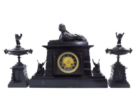 Black slate two train mantel clock garniture in the Egyptian taste, the movement striking on a bell, the 4.25" slate dial wit