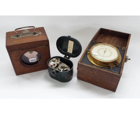 Belgica oak cased pigeon timer; together with two Venner time switches (3)