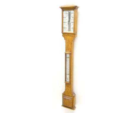 Oak stick barometer/thermometer, the barometer scale signed L. Dixey, 21, Kings Road, Brighton over a glazed thermometer scal