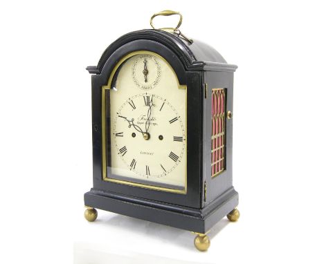 English ebonised double fusee bracket clock, the back plate with locking pendulum and the 7" cream painted arched dial both s