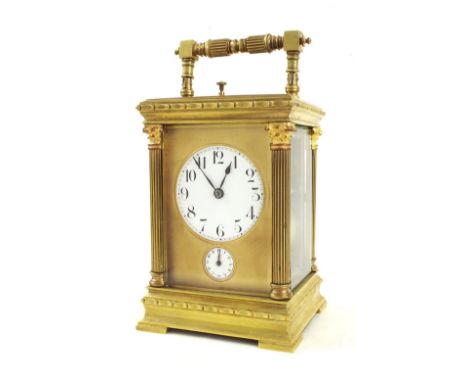 French repeater carriage clock with alarm striking on a gong, the 2.25" principal dial over an alarm dial within a gilt mask 