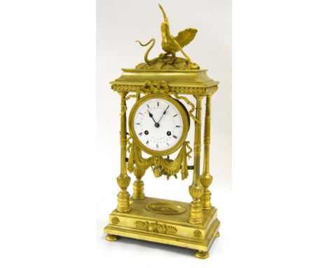 Good French ormolu two train portico mantel clock, the movement with outside countwheel striking on a bell, the 4.25" white d