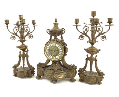 Gilt metal two train mantel clock garniture, the Japy Freres movement with outside countwheel striking on a bell, the 4.5" re