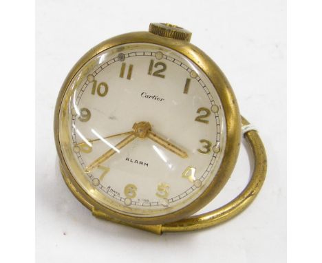 Small brass eight day alarm desk clock timepiece, the 2.25" silvered dial signed Cartier within a cushion case and upon a bra