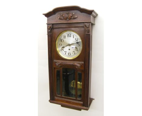 1930s mahogany Westminster chime three train wall clock, the 7.5" silvered dial within a glazed case (pendulum)