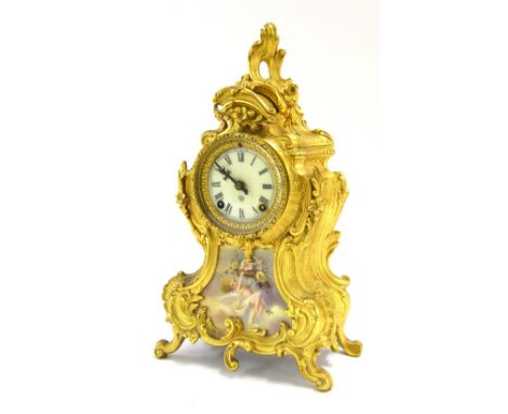 Ansonia gilt metal and porcelain mounted two train mantel clock striking on a gong, the 3" cream dial within a rococo balloon