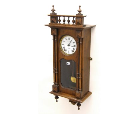 Contemporary walnut two train Vienna wall clock, the 5.25" dial signed E. Lahaye, Soissons within a pillared glazed case, 34"