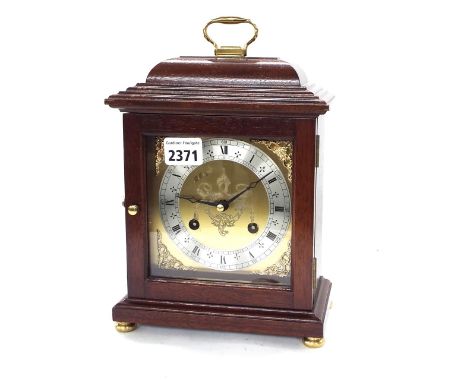 Modern mahogany striking bracket clock, the square brass 5" dial with silvered Roman numeral chapter ring, the movement strik