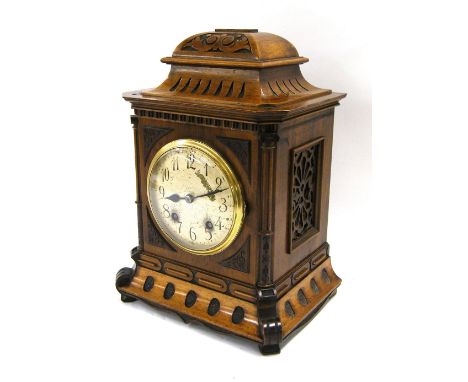 German walnut two train ting-tang mantel clock with Lenzkirch movement, the 5.25" silvered dial within a stepped carved case 