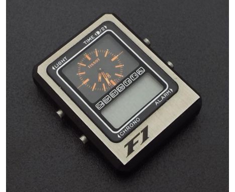 Tissot TSX6F1 analogue/digital watch, easel back, 44mm x 35mm