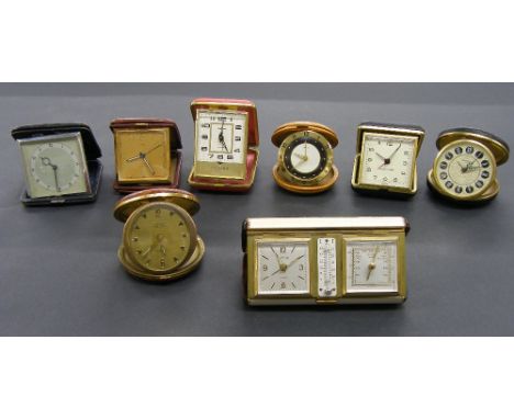 Small Europa travelling alarm clock/barometer and thermometer, within a folding faux tortoiseshell case; also seven various f