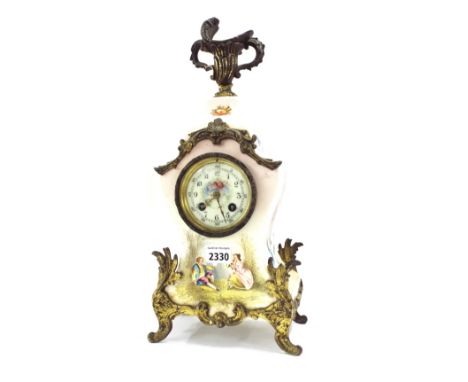 French pottery two train mantel clock, the movement with outside countwheel striking on a bell, the 3.25" cream dial within a