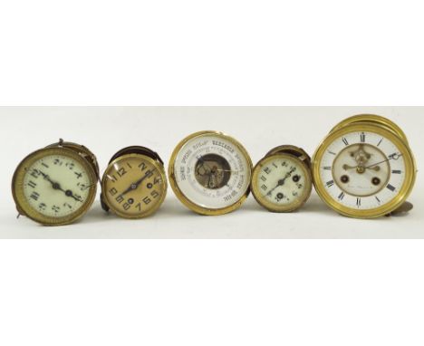 Four various French clock movements (three with pendulums); together with a French aneroid barometer (5)