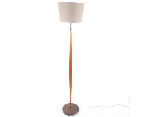 A mid-century floor lamp, with teak stem and brass base, height 141cmGood condition.  Tarnished base, signs of wear consisten