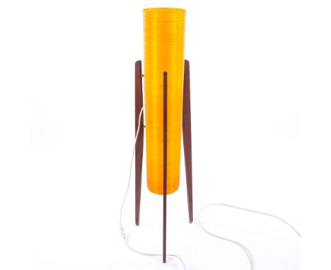 A 1970's retro yellow fibreglass 'rocket' lamp, on teak legs, height 110cm 