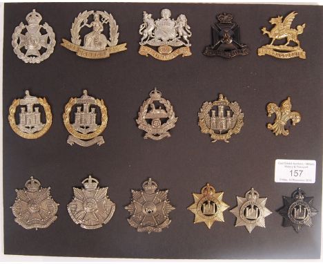 A collection of x16 vintage British Army military uniform cap badges - all relating to Territorial / Volunteer regiments. Inc