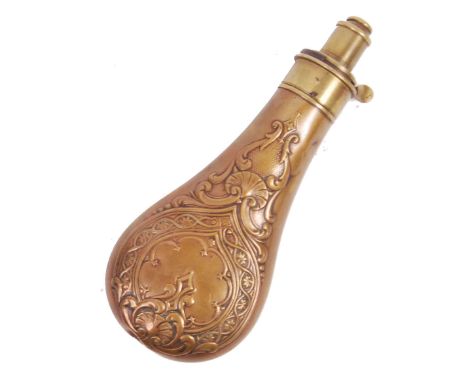 A 19th century brass gun powder flask having acanthus leaf, shell and foliate repousse detailing and release measure funnel t